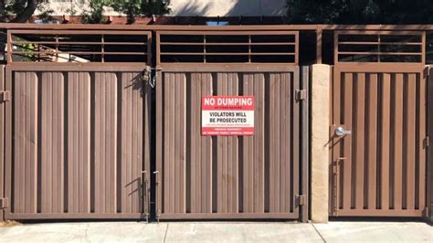 trash enclosrue doors with metal panels fabrication details|trash enclosure types.